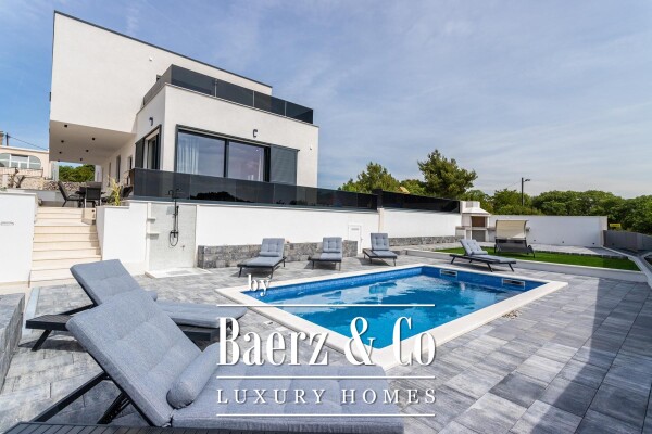 photo 3 Seget, a contemporary villa with an open sea view