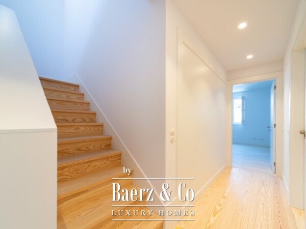 photo 12 Three-Bedroom Duplex with Balcony, Two Parking Spaces, and Storage Room